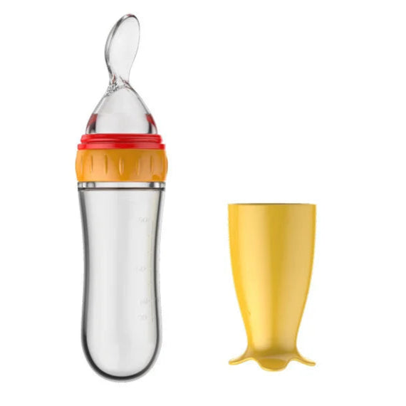 Cuillère bébé BabyGigi avec réservoir 90 ml – silicone sans BPA, couleur orange